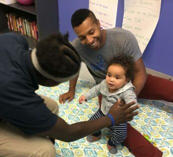 Mastery small group holding hands